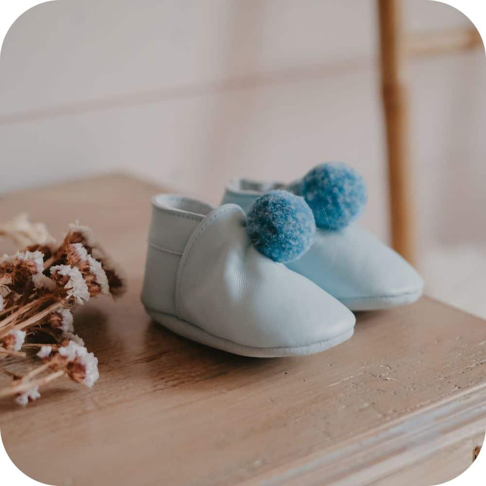 Pantofole in pelle con pompon "Azzurro"
